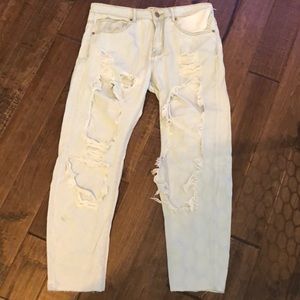 Light washed distressed denim jeans